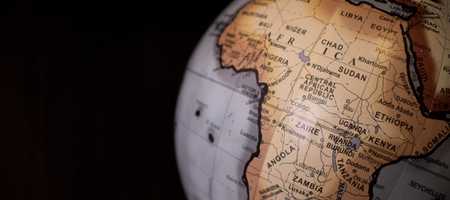 A globe featuring the African continent and part of the Arabian penisula.